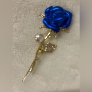 Elegant Blue Rose Brooch with Gold Accents